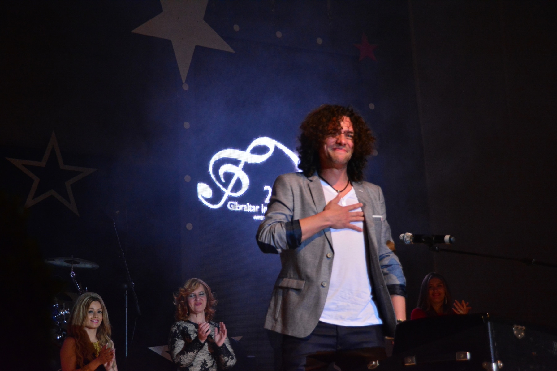 Gibraltar - 9th May 2015 - Mo Anton took the first prize at the V Gibraltar Song Festival held at the Tercentennary Sports Hall in Gibraltar.Fourteen singers competed in the final from across the world following over 700 entries. Among the singers were Greeks, French, Israeli, Spanish, Irish and Gibraltarian singers,