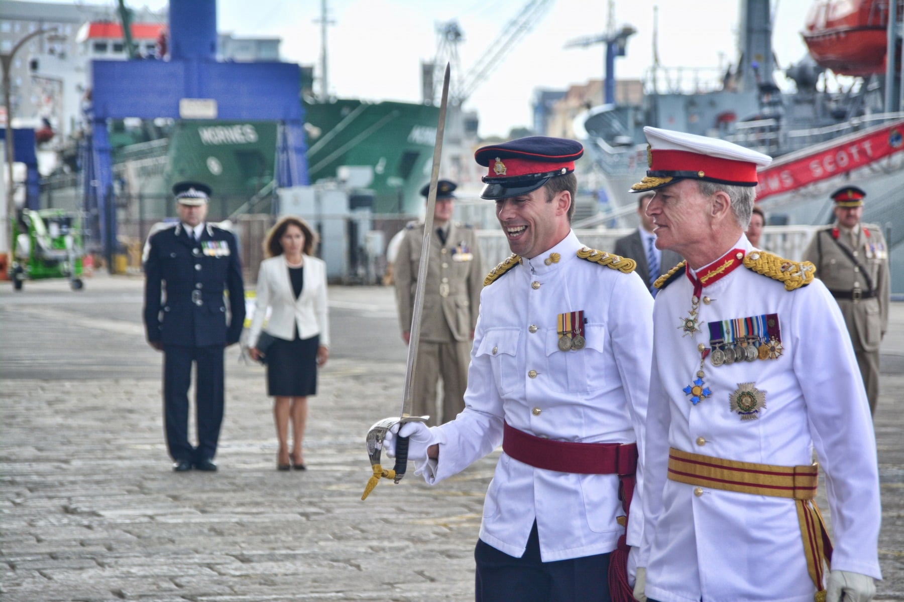 Gibraltar -28th September 2015 - The Governor of Gibraltar today departed From office bidding Farewell to politicians and the armed Forces in what ended up to be a low Key ceremony. A short farewell ceremony at the Parliament lobby was followed by a quick farewell at the city Hall, defer he inspected troops at the Naval Base. He then boarded HMC Seeker where a 17 gun salute bid him farrwell.