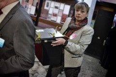 Gibraltar - 27th November 2015 - With security around John Macintosh Hall tightened, the first ballot box surprised everyone arriving dead on 10pm, the time polling stations were supposed to close their doors. A stream of ballot boxes then arrived as GBC announced the results of their exit poll putting the GSLP/Liberal Alliance ahead with 72%. As counting started by midnight candidates started to arrive at John Macintosh Hall where the count is taking place.One of the first candidates to arrive was John Cortes, followed by Edwin Reyes. Moments later Joseph Garcia, Gilbert Licudi, Albert Isola and Steven Linares arrived to a somewhat quite JHM as counting started.The verification count was overseen by agents of both parties, with the Governor Alison Macmilan also visiting JMH to oversee the protocols being followed, as is traditional during general elections in Gibraltar.John Macintosh Hall also saw tonight armed patrols present around the area, in keeping with the high security alert status presently experienced in Gibraltar. The security detail deployed included the presence of an inspector within the armed response detail, this being one of the few occassions in which a high ranking officer has been seen present as part of the unit when in public.