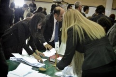 Gibraltar - 27th November 2015 - With security around John Macintosh Hall tightened, the first ballot box surprised everyone arriving dead on 10pm, the time polling stations were supposed to close their doors. A stream of ballot boxes then arrived as GBC announced the results of their exit poll putting the GSLP/Liberal Alliance ahead with 72%. As counting started by midnight candidates started to arrive at John Macintosh Hall where the count is taking place.One of the first candidates to arrive was John Cortes, followed by Edwin Reyes. Moments later Joseph Garcia, Gilbert Licudi, Albert Isola and Steven Linares arrived to a somewhat quite JHM as counting started.The verification count was overseen by agents of both parties, with the Governor Alison Macmilan also visiting JMH to oversee the protocols being followed, as is traditional during general elections in Gibraltar.John Macintosh Hall also saw tonight armed patrols present around the area, in keeping with the high security alert status presently experienced in Gibraltar. The security detail deployed included the presence of an inspector within the armed response detail, this being one of the few occassions in which a high ranking officer has been seen present as part of the unit when in public.