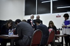 Gibraltar - 27th November 2015 - With security around John Macintosh Hall tightened, the first ballot box surprised everyone arriving dead on 10pm, the time polling stations were supposed to close their doors. A stream of ballot boxes then arrived as GBC announced the results of their exit poll putting the GSLP/Liberal Alliance ahead with 72%. As counting started by midnight candidates started to arrive at John Macintosh Hall where the count is taking place.One of the first candidates to arrive was John Cortes, followed by Edwin Reyes. Moments later Joseph Garcia, Gilbert Licudi, Albert Isola and Steven Linares arrived to a somewhat quite JHM as counting started.The verification count was overseen by agents of both parties, with the Governor Alison Macmilan also visiting JMH to oversee the protocols being followed, as is traditional during general elections in Gibraltar.John Macintosh Hall also saw tonight armed patrols present around the area, in keeping with the high security alert status presently experienced in Gibraltar. The security detail deployed included the presence of an inspector within the armed response detail, this being one of the few occassions in which a high ranking officer has been seen present as part of the unit when in public.