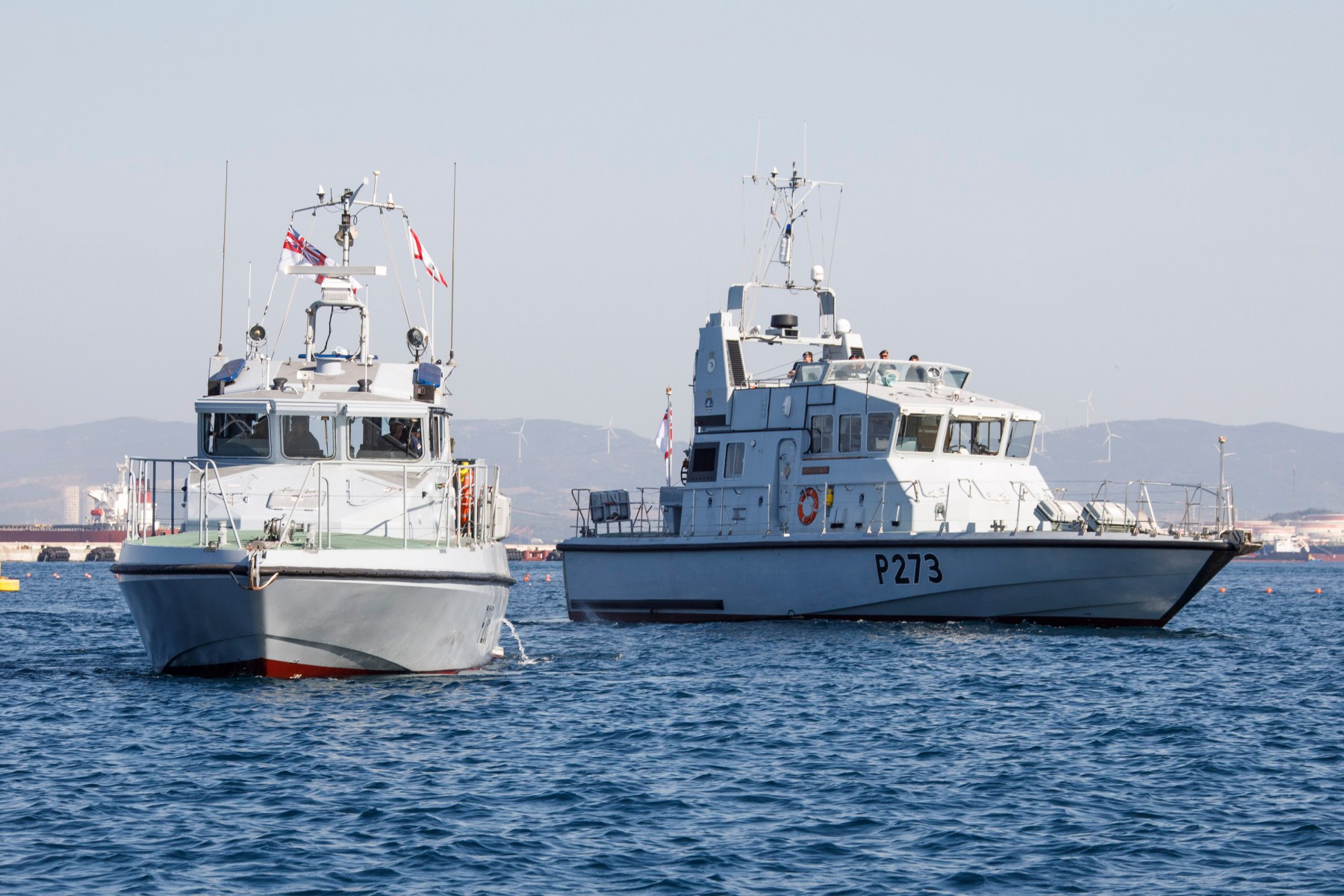 Royal Navy Gibraltar Squadron with four boats at sea.