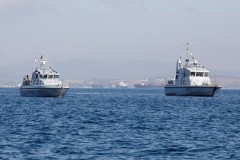 Royal Navy Gibraltar Squadron with four boats at sea.