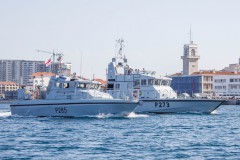 Royal Navy Gibraltar Squadron with four boats at sea.